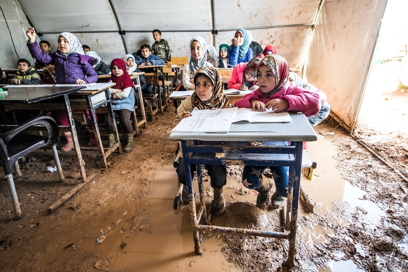 Refugee children attend class in Azez, Syria